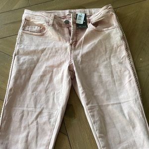 Kidpik light pink jeans with silver studs along sides. Size 14. Never been worn